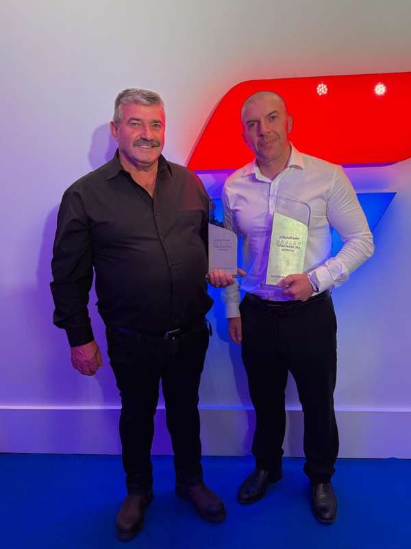 Mit-Mak receiving a Dealer of the Year award