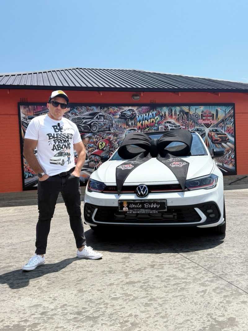 Uncle Bobby with a car sold at Mit-Mak Motors